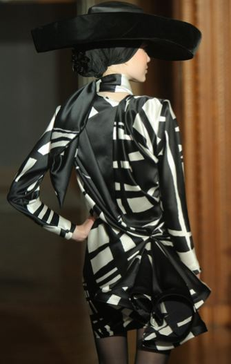 Illustration for article titled Christian Lacroix Couture Show A Blitz Of Somber Creativity For Dark Times